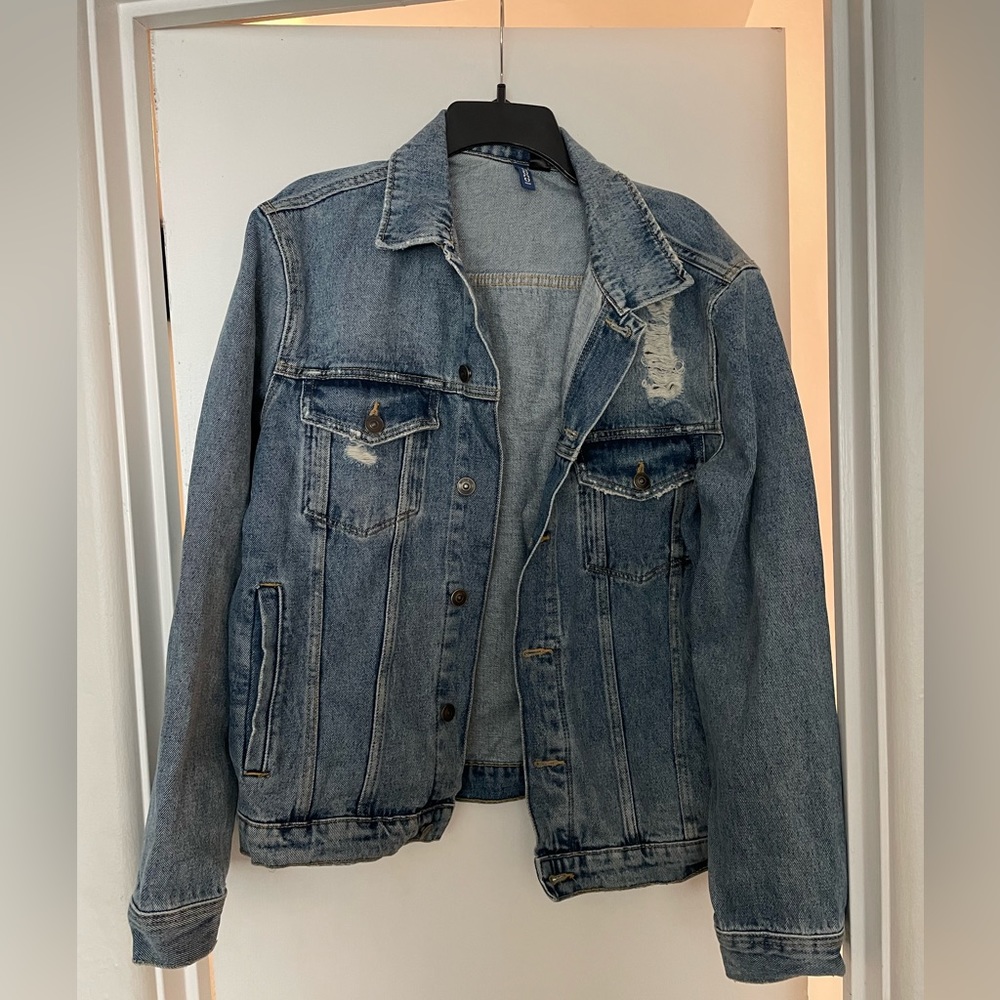 Distressed denim jacket
